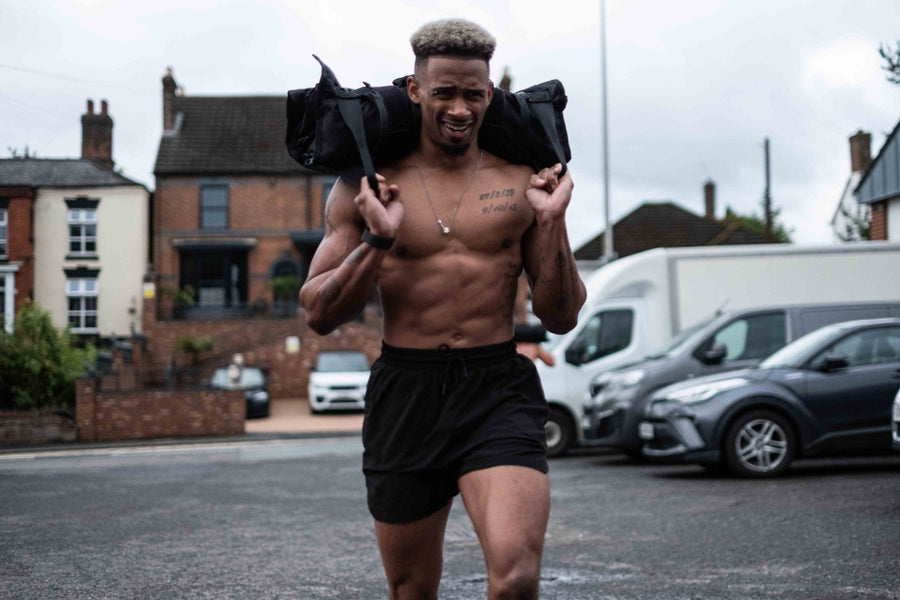 How to Do a Sandbag Carry and Get Seriously Strong